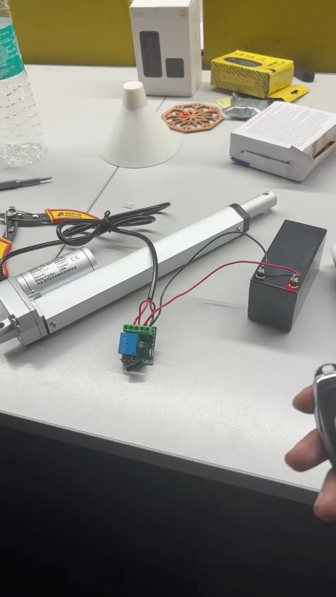 Linear actuator, relay control board, and battery laid out for a load-bench test